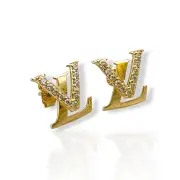 Златни обеци на винт с цирконии и дизайнерска форма 14K RG13205