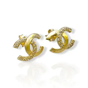 Дамски златни обеци на винт с циркони и преплетен дизайн 14K RG13207